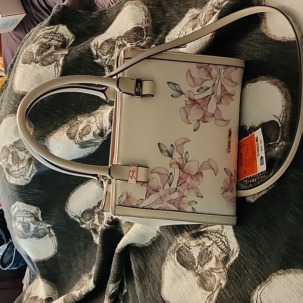 Beautiful Calvin Klein white floral purse